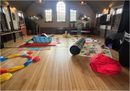 The full Fidget and Spin Stay and Play set-up, showing all three sensory zones and a variety of play equipment.